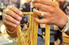 Gold jewelry worth Rs 2 lakh lifted by a customer